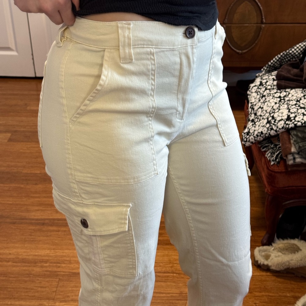 Cream colored straight leg cargo pants